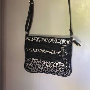 Leopard print cross body satchel.
